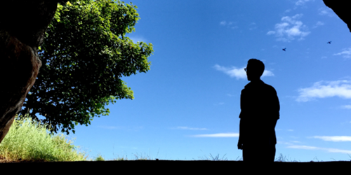 Fife man looking out with blue skys