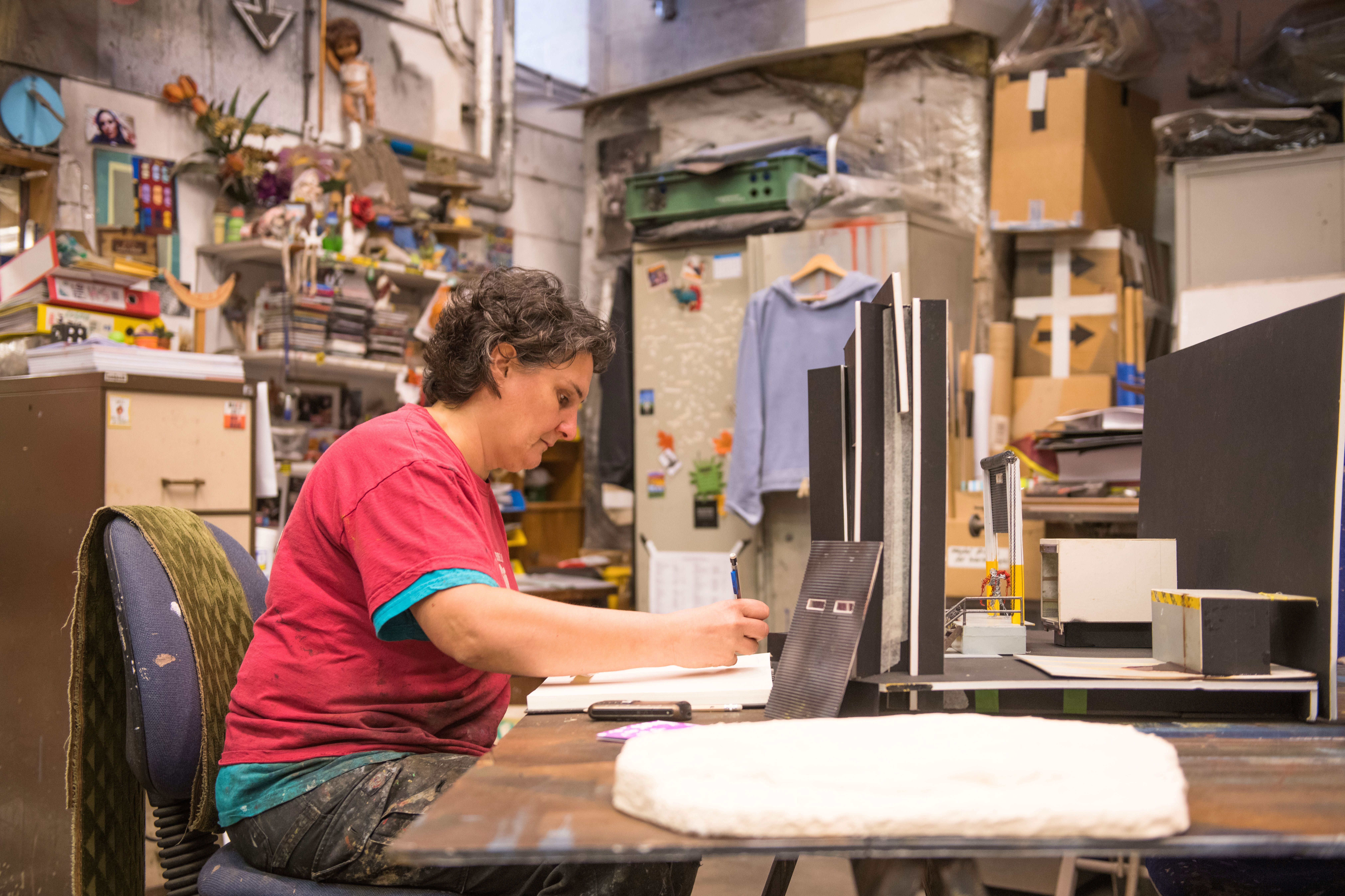 Leila Working In The Paintshop. Photo By Tommy Ga Ken Wan