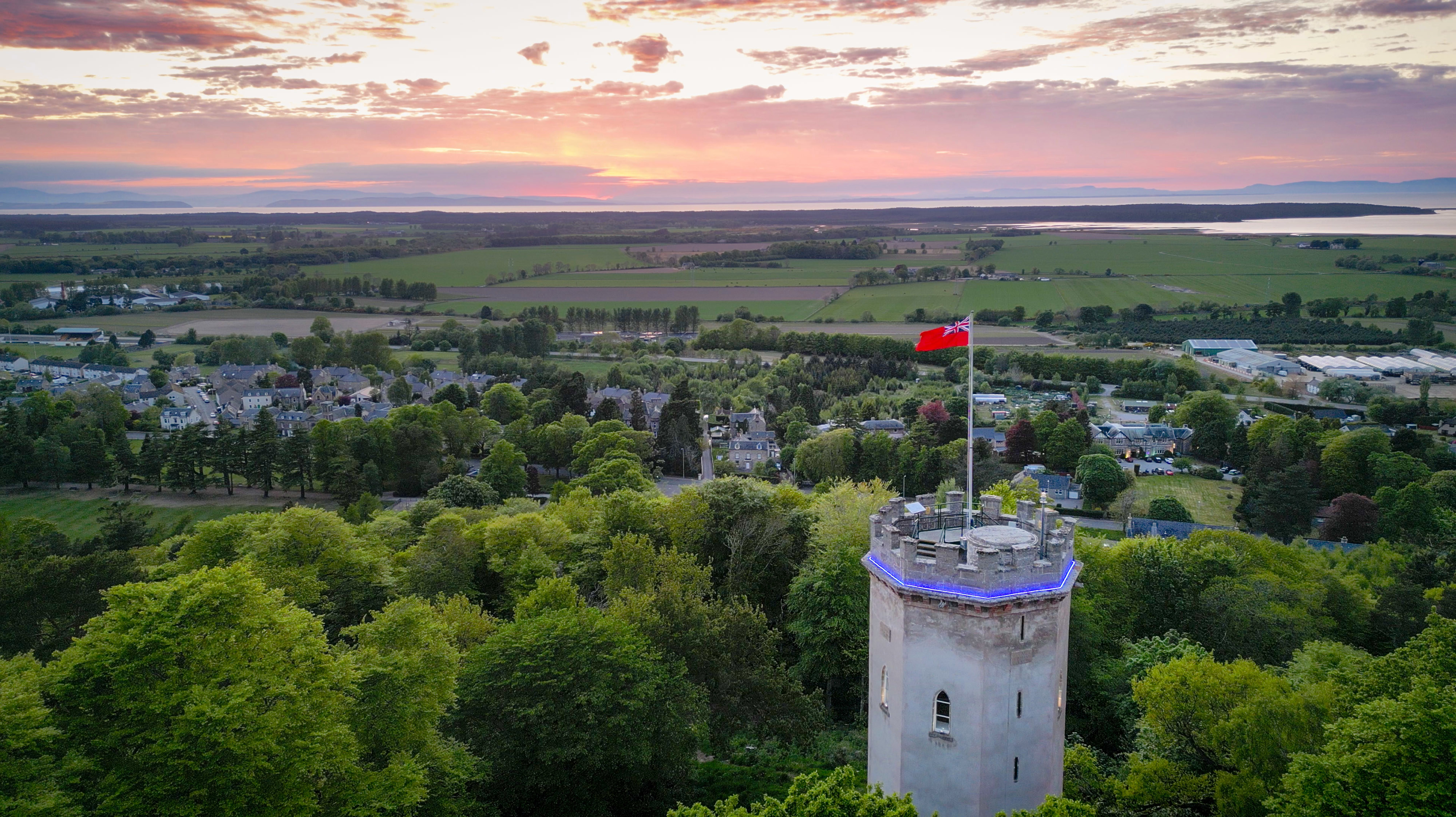Nelson Tower Evening Sunset With Lights